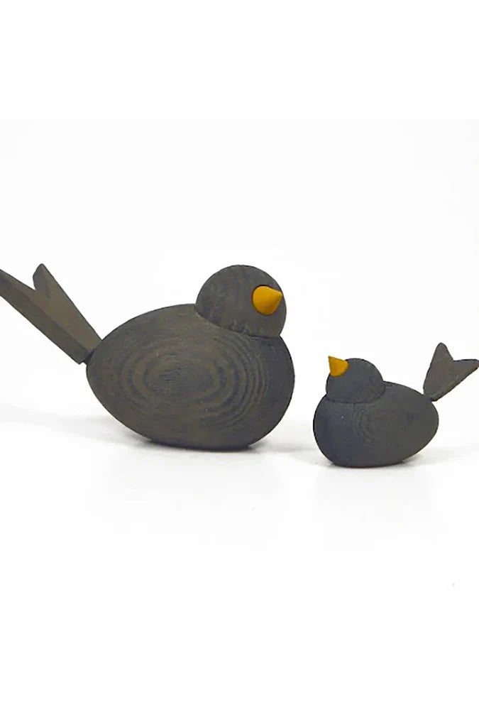 Holzvogel grau